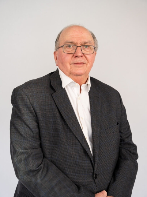 Professional headshot of David Collins